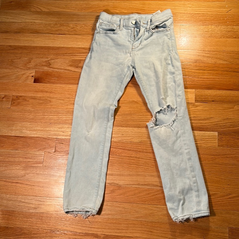 Light blue ripped jeans
